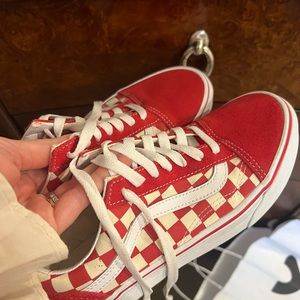 Red checker vans lace ups.